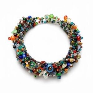 Artisan MultiColor Seed Bead Bracelet
Statement Vibrant Glass Wrap
Adjustable